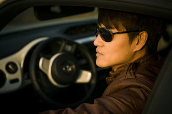 canva man with sunglasses inside a car MADQ5pcKodI