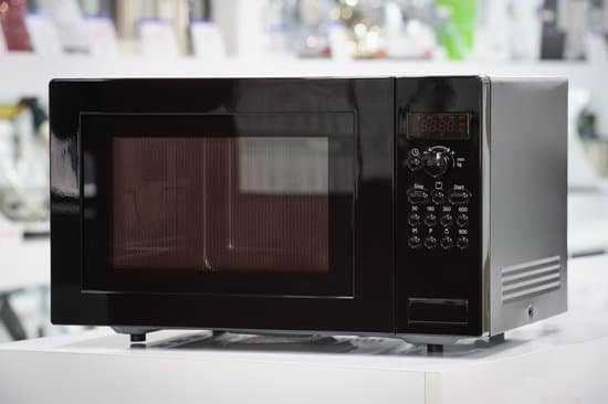 canva microwave oven in retail store MADBmIKwI18