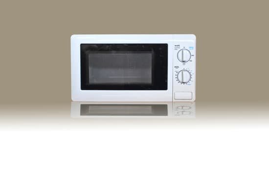 canva microwave oven on background MADApAkIAAg