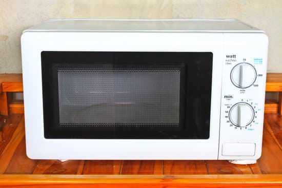 canva microwave oven on the table MAC zjkWrp8