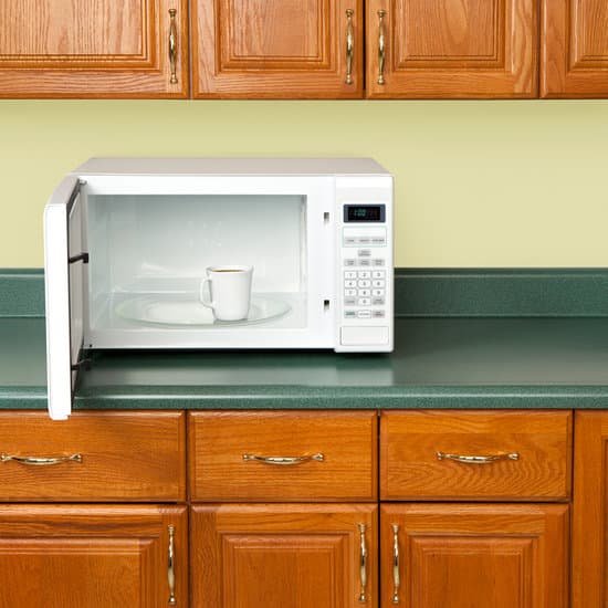 canva microwave oven with coffee