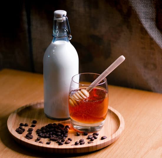 canva milk and honey on wooden tray MAD1wS69cbs