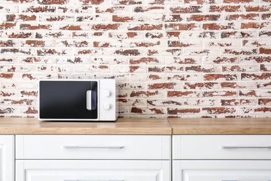 canva modern microwave oven in kitchen MAEGCcobarI