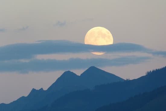 canva moon above the mountains MADQ5jWa5cQ