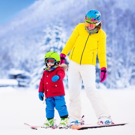 canva mother and little boy skiing in alps mountains MADE6 0TUWY