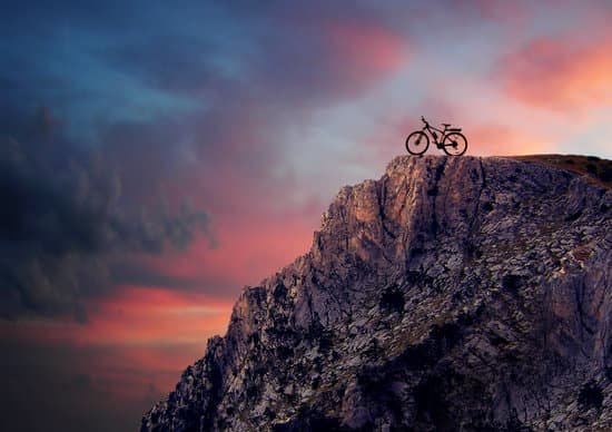 canva mountain bike in mountains MADsWhLVFQA