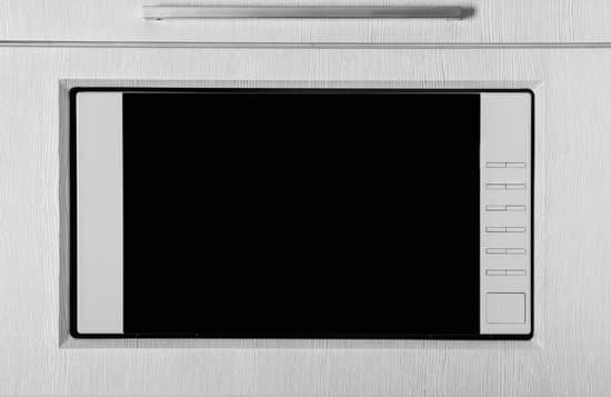 canva new white microwave oven in kitchen closeup MAD9WgqSV g