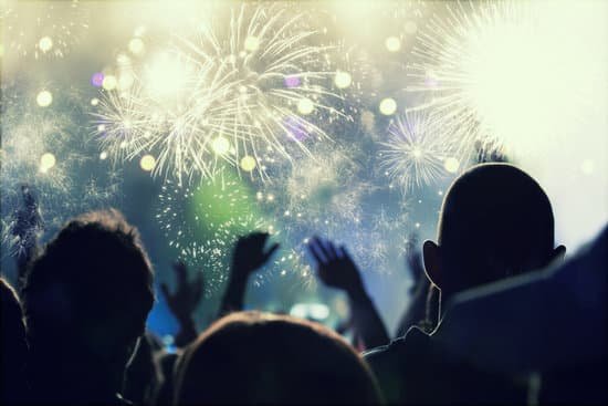 canva new year concept cheering crowd and fireworks MADaFPCpU k
