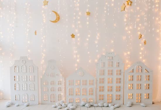 canva new years scenery glowing city buildings garlands lights MADapjALkG0