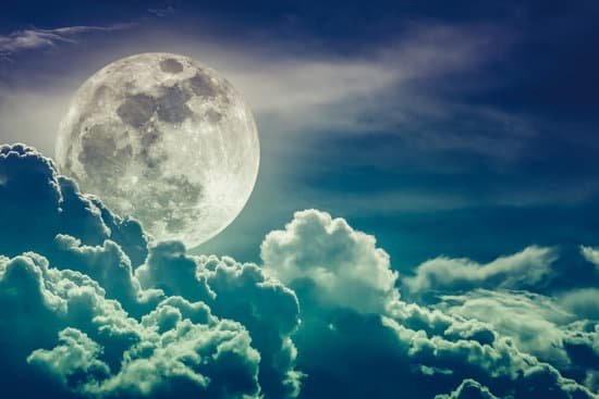 canva nighttime sky with clouds and bright full moon with shiny. MADasVkGqtc