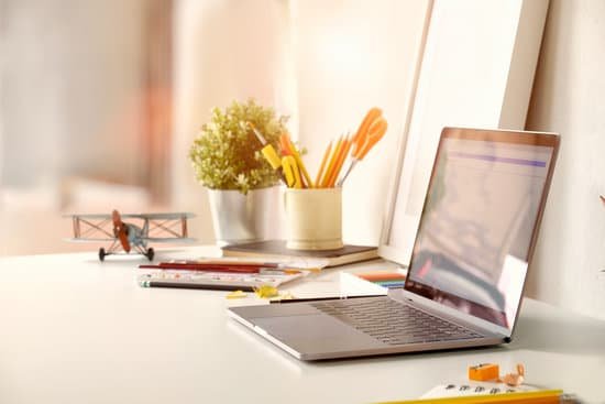 canva office work table with laptop. MADapHoO9UM