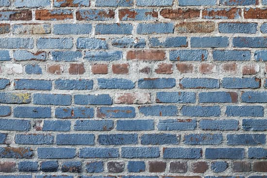 canva old brick wall painted in blue MADQ4hcjK o