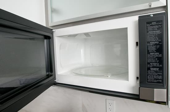 canva open microwave oven in kitchen MAC8If1QEk0