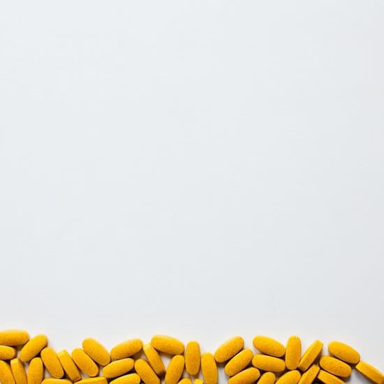 canva orange vitamin pills background MADB8WO Qu8