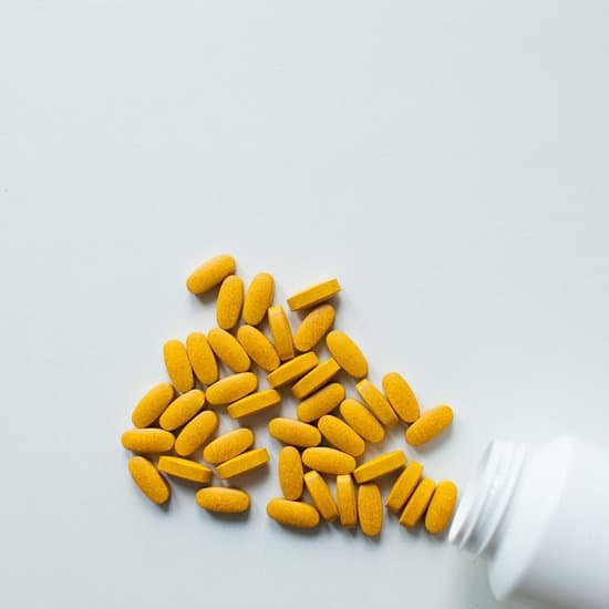 canva orange vitamin pills background MADB8WgwB6k