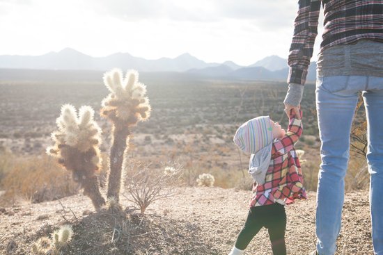 canva person holding toddler hand MADGyCYgYDM