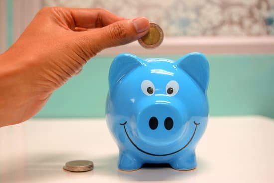 canva person putting coin in a piggy bank MADyQ44yPGE