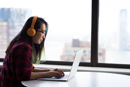 canva photography of woman using laptop MADGvyMm 10