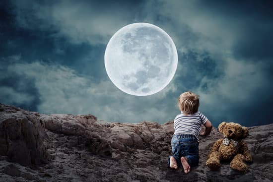 canva photomontage of child staring the full moon MADQ5aG2IPk