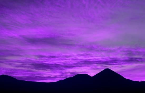 canva pop art style vibrant purple colored twilight sky over the mountains silhouette MAD6sfXptTU