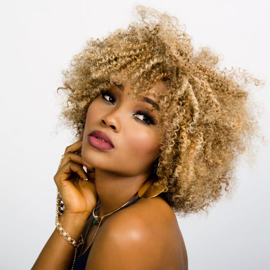 canva portrait of a woman with curly hair MADQ4hyFCaM