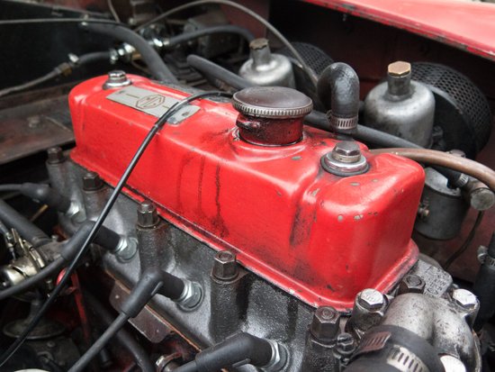 canva red and grey vehicle engine