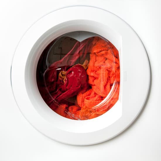 canva red laundry in a washing machine MACDkPMA29U