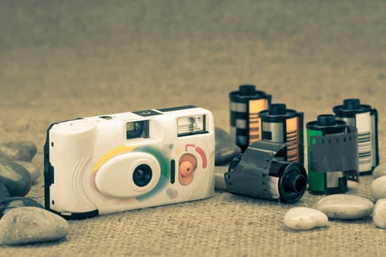 canva retro film camera and film cartridge MAEfi3zJr1U