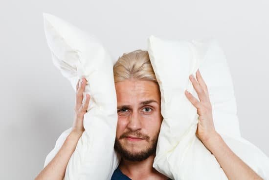 canva sad man closing ears with pillows MADerEq06wc