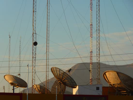 canva satellite dishes and cable wires connected to radio towers MAEFiobo 3U