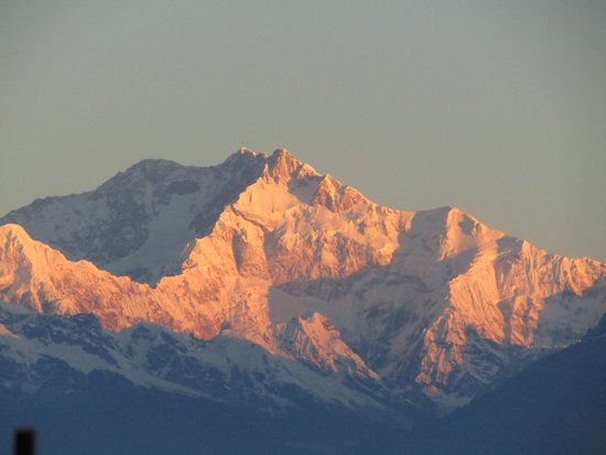 canva scenic view of snowcapped mountains against sky at sunset