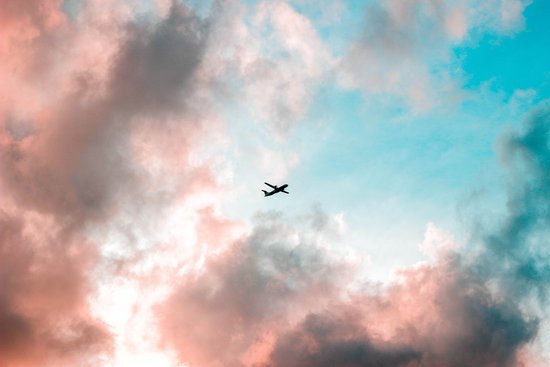 canva silhouette of airplane under cloudy sky MADGwGkI ho