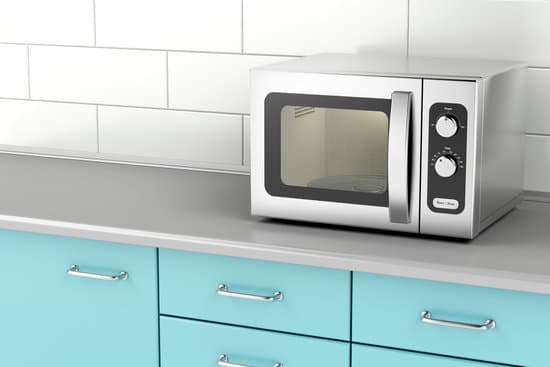 canva silver microwave oven in the kitchen MACbodDIO28