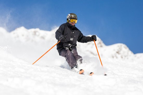canva skier skiing on ski slope MADFJbe7yFM