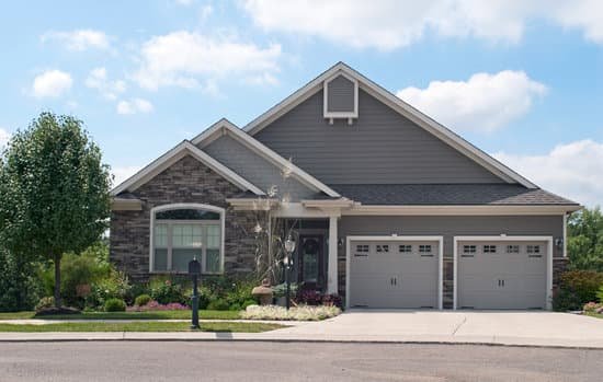 canva small house with two car garage MADerNcQw k