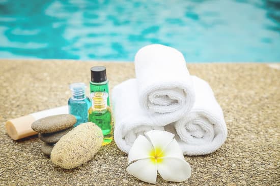 canva spa concept background spa set with space on swimming pool MAEV5acHdaQ