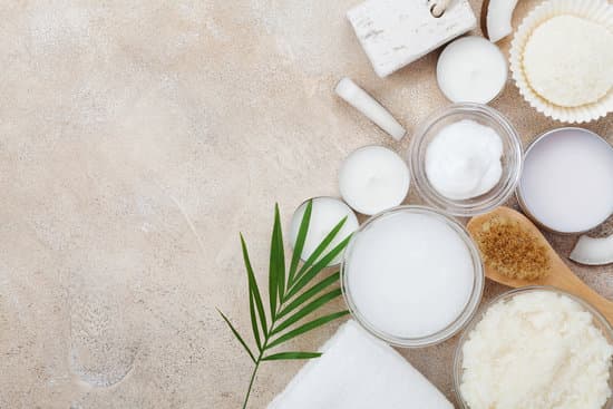 canva spa setting from body care and beauty treatment. organic coconut scrub oil and cream on stone table top view. flat lay. MADZ 8rXOfo
