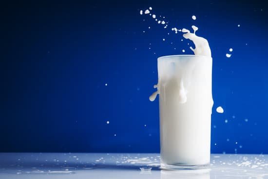 canva splash of milk in glass MADA Ma7BsI