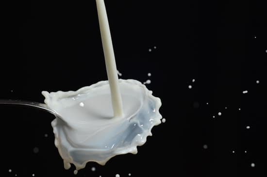 canva splattered milk on a spoon MADQ49PoYaU