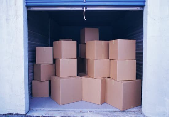 canva stacks of boxes in open garage MAC8UmQ6nLk