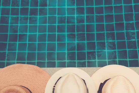 canva straw hats by the pool MAD R04lPwc