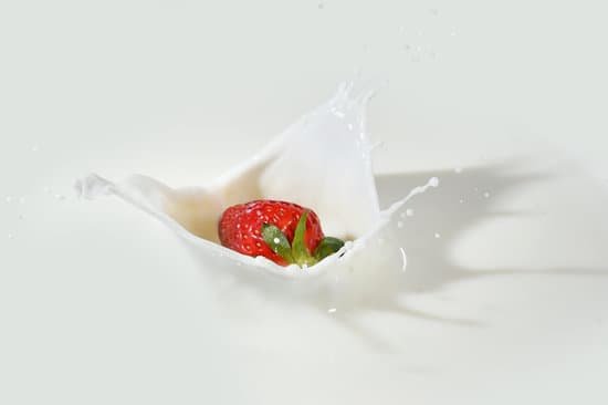 canva strawberry drop on milk