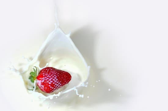 canva strawberry fruit dropped in milk MADyQ5CPoCo
