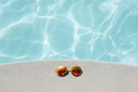 canva sunglasses by the pool MADQ4yNw1a0