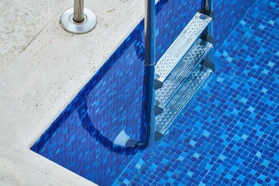 canva swimming pool with stainless steel ladder MADyRLjWOQg