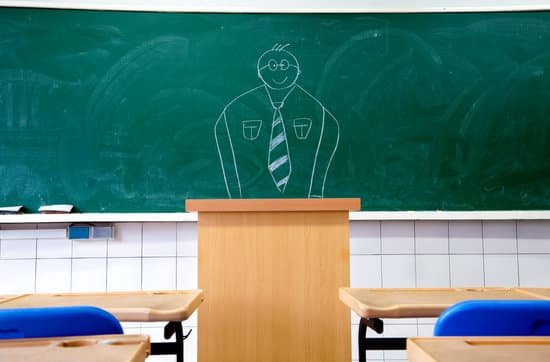 canva teacher on the blackboard and empty classroom MADaAI b1Y