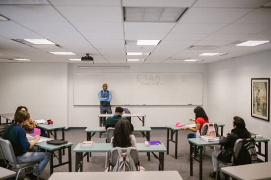 canva teacher proctoring his students during an examination MAEYUR6wtDo