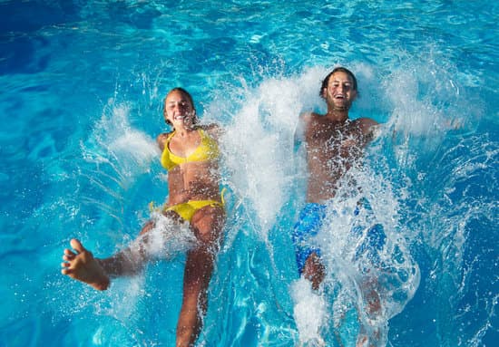 canva teenagers jumping into swimming pool MADaqdnjDrQ