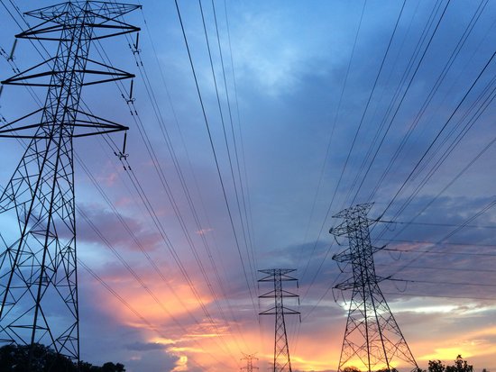 canva transmission tower under gray sky