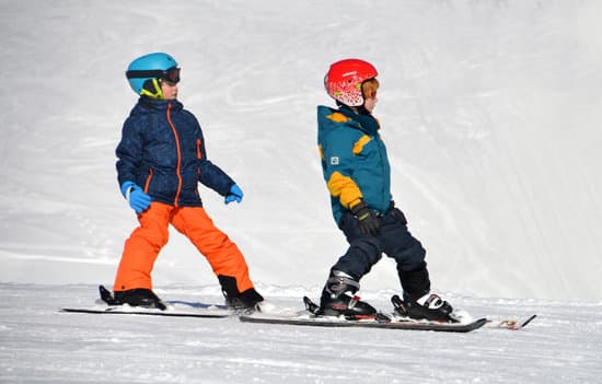canva two boys skiing MADQ5TbEQDI